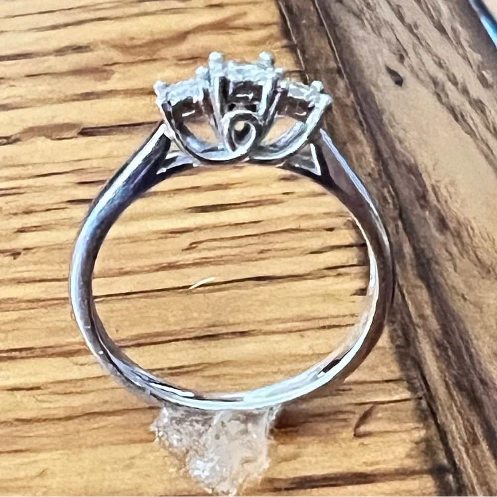 Trumiracle 1/10 Carat Total Weight 3-Stone Diamond Ring set in Sterling Silver
